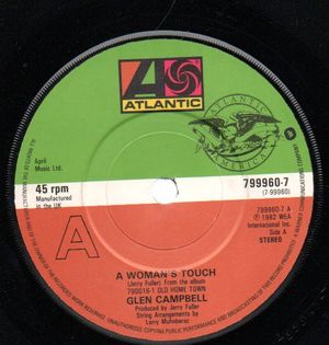 GLEN CAMPBELL, A WOMAN'S TOUCH / HANG ON BABY (EASE MY MIND)